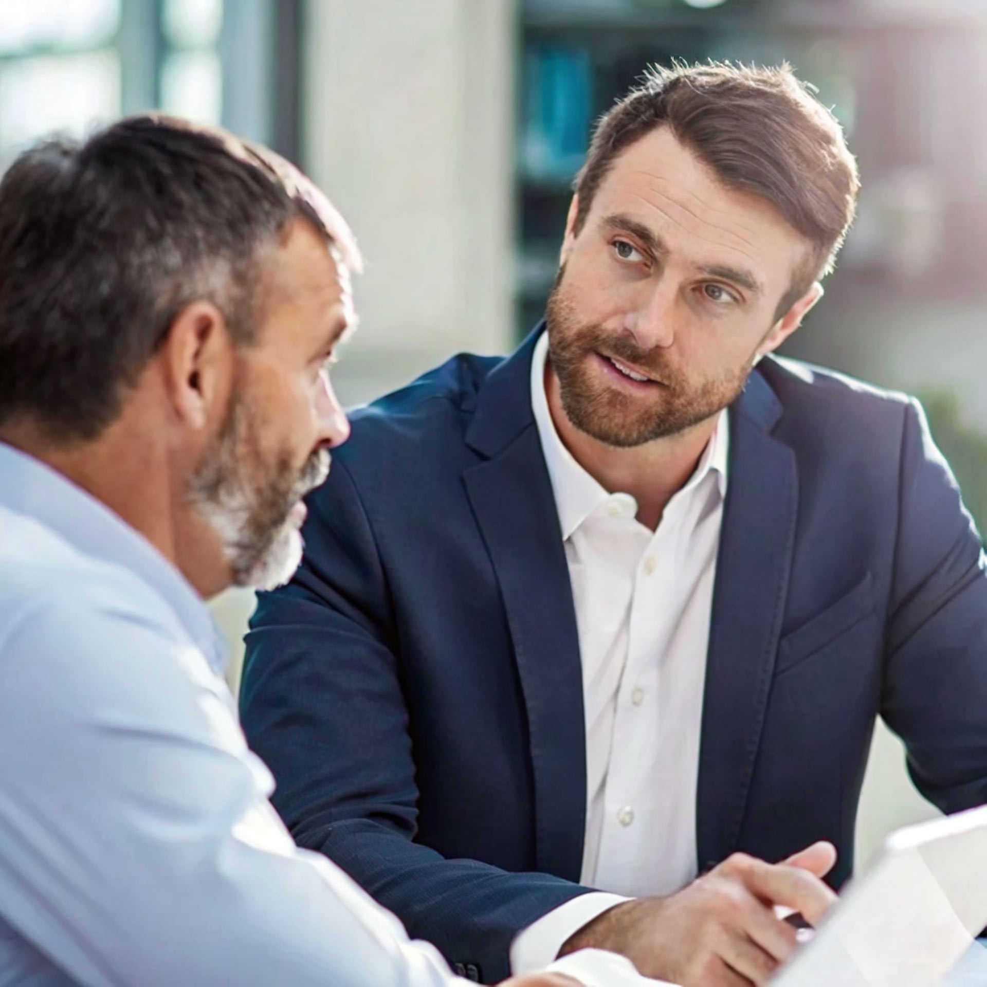 Two men having a discussion.